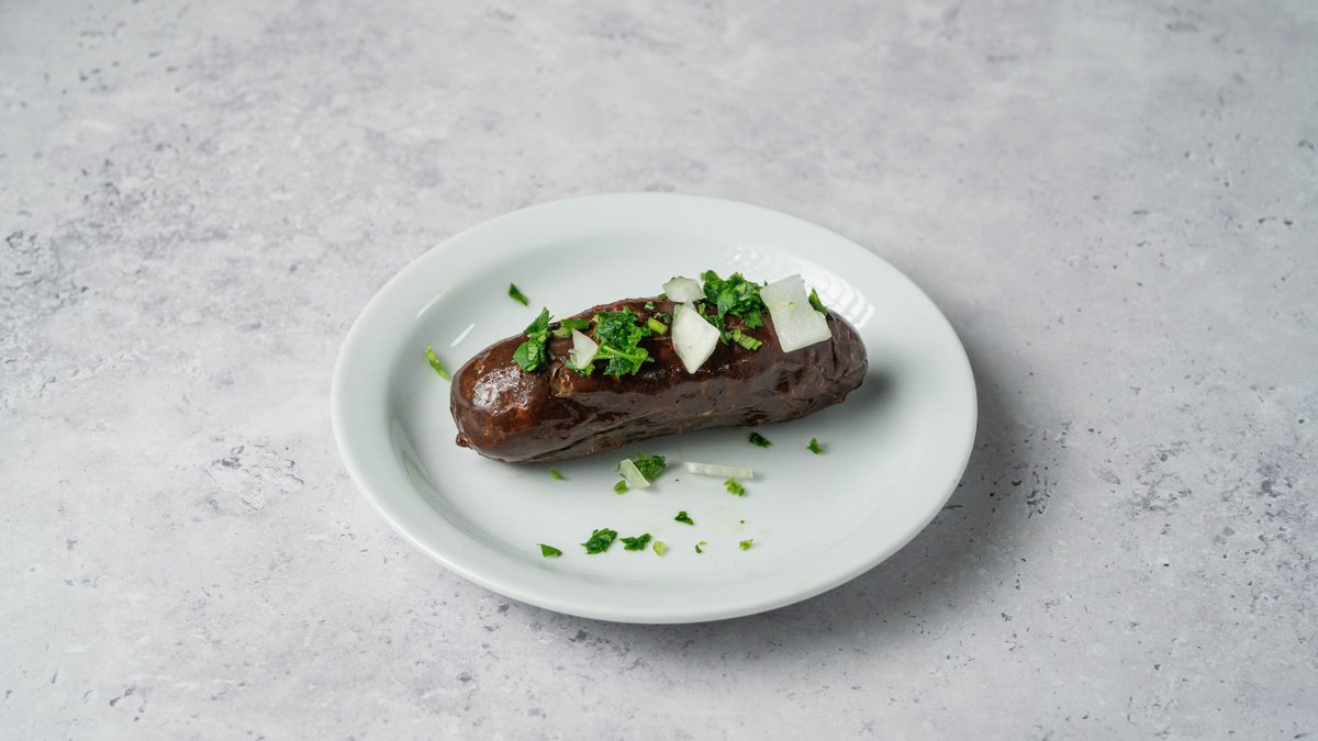 Individual grilled souvlaki and sheftalia pieces, traditional Cypriot style